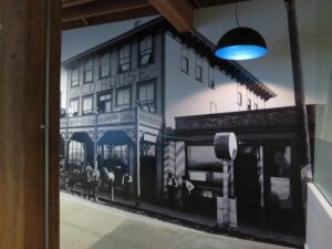 Old downtown photo mural by Twill Wallcoverings